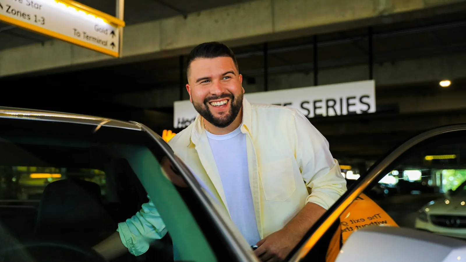 A TV spot for a car brand: a smiling driver getting into his car