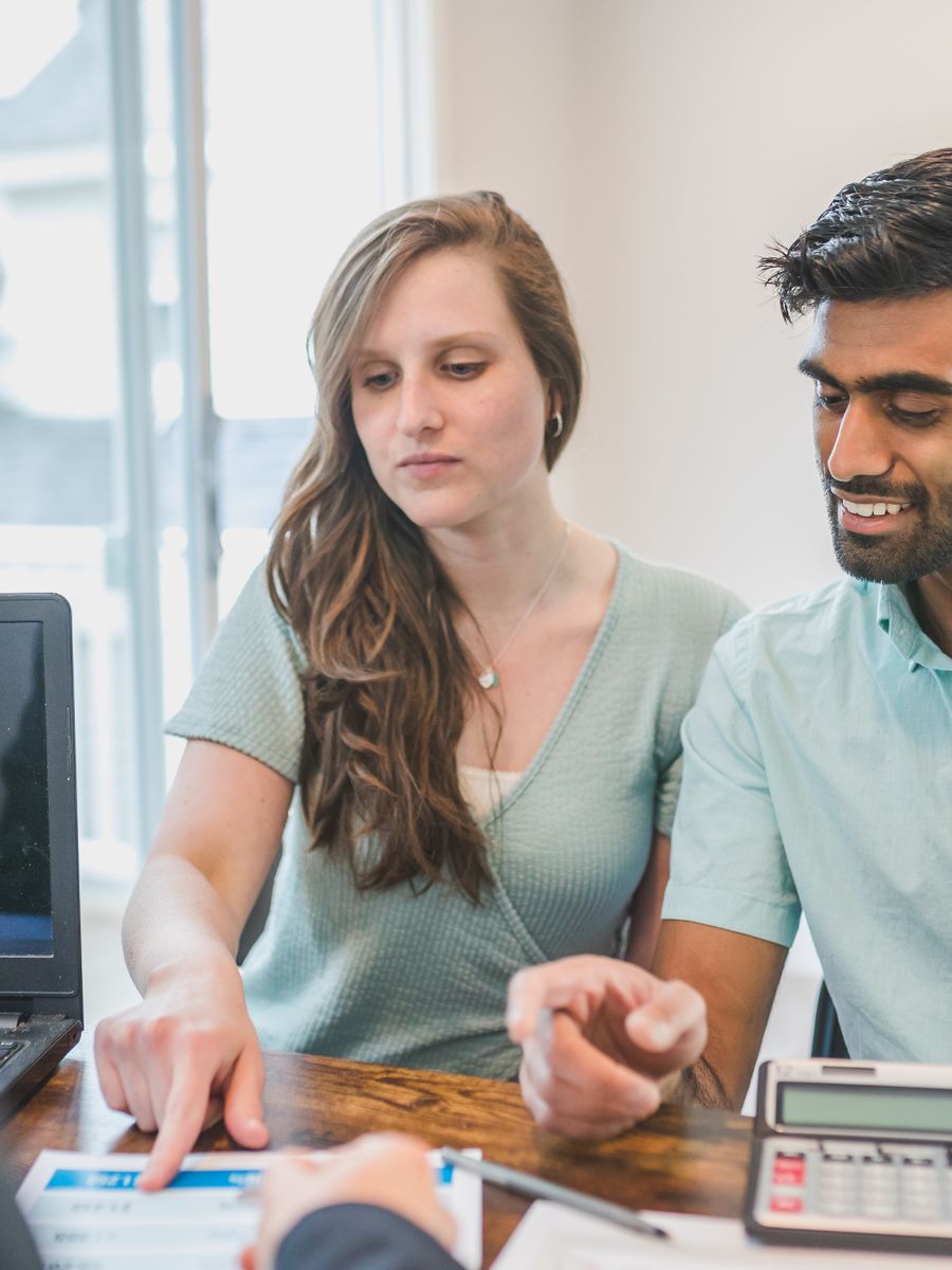 A financial advisor meeting with a couple