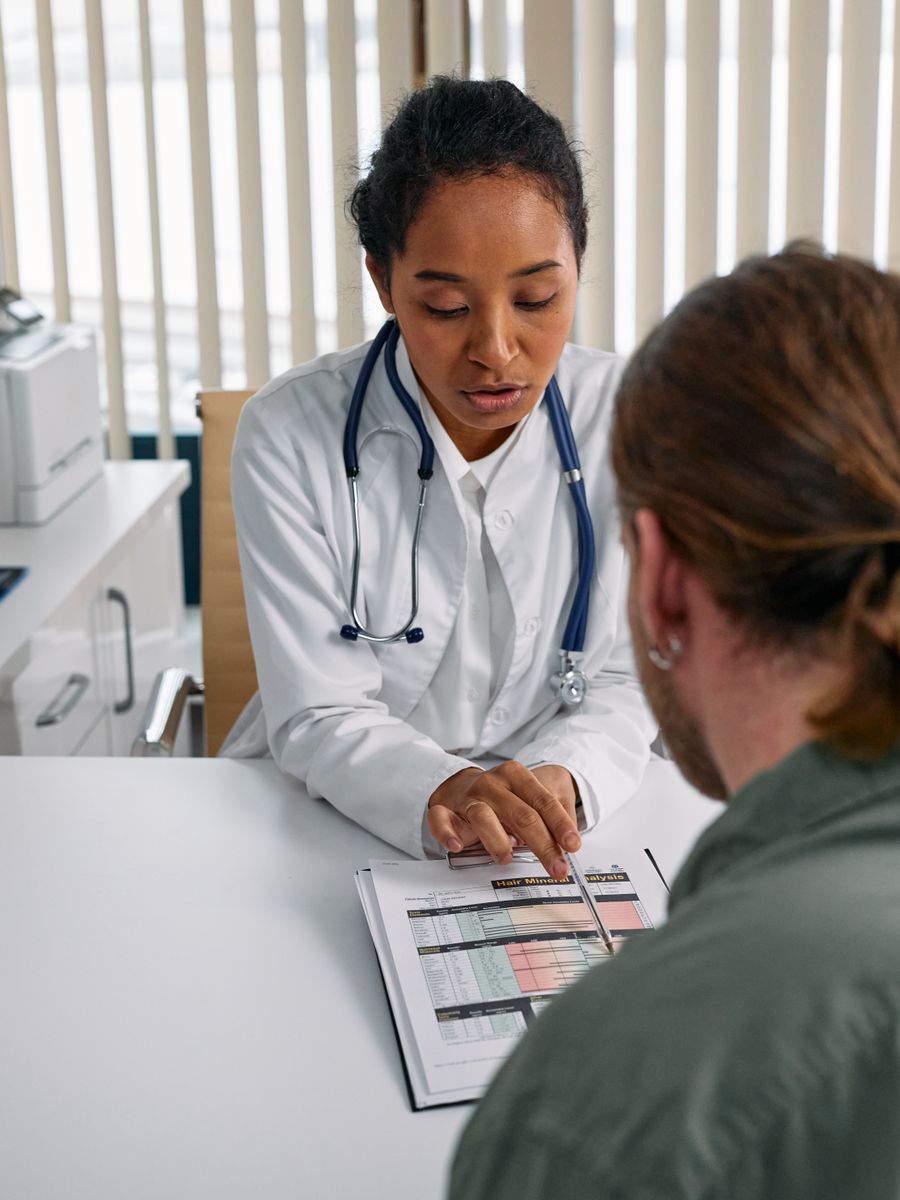 A doctor reviewing care with a patient
